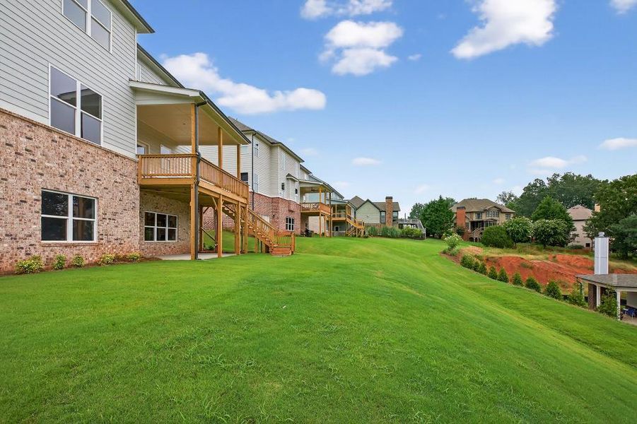 Front exterior of a new home in Traditions Of Braselton, Jefferson, GA, highlighting curb appeal (Image 30). Front exterior of a new home in Traditions Of Braselton, Jefferson, GA, highlighting curb appeal (Image 30).