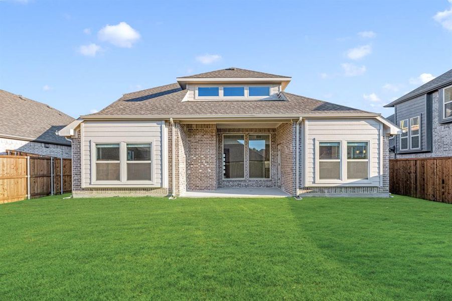 Exterior details and patio area of a home in Woodstone, Providence Village (Image 22). Exterior details and patio area of a home in Woodstone, Providence Village (Image 22).