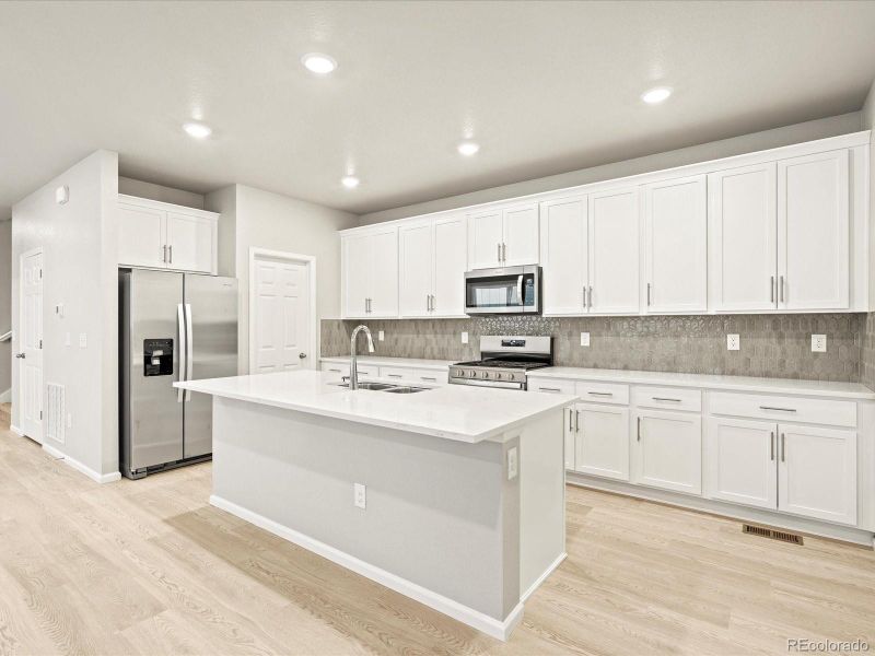 Photos are representative only and are not of the actual home. Actual finishes, elevation, and features may vary.