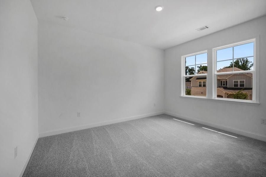 Representative unfurnished interior of a home built from the Aiken by Taylor Morrison in Kennison Creek, Cumming (Image 26).