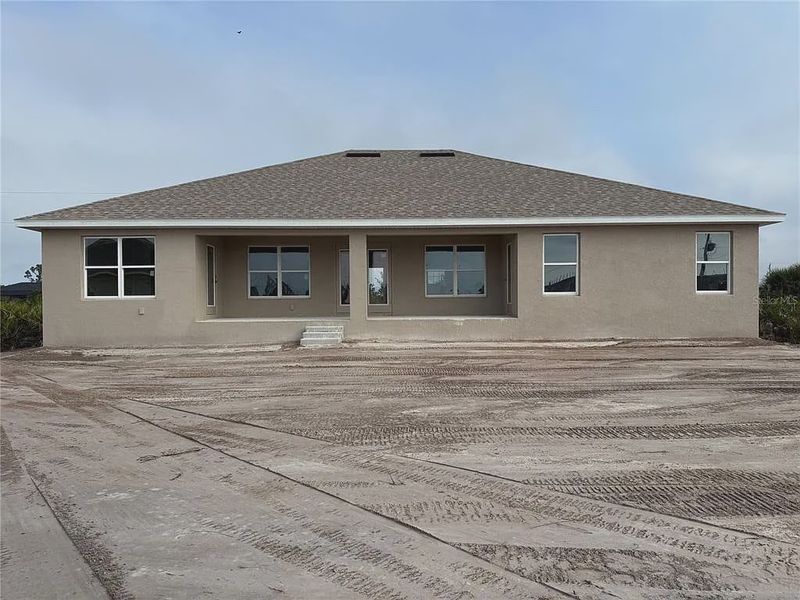Exterior details and patio area of a home in South Gulf Cove, Port Charlotte (Image 3).