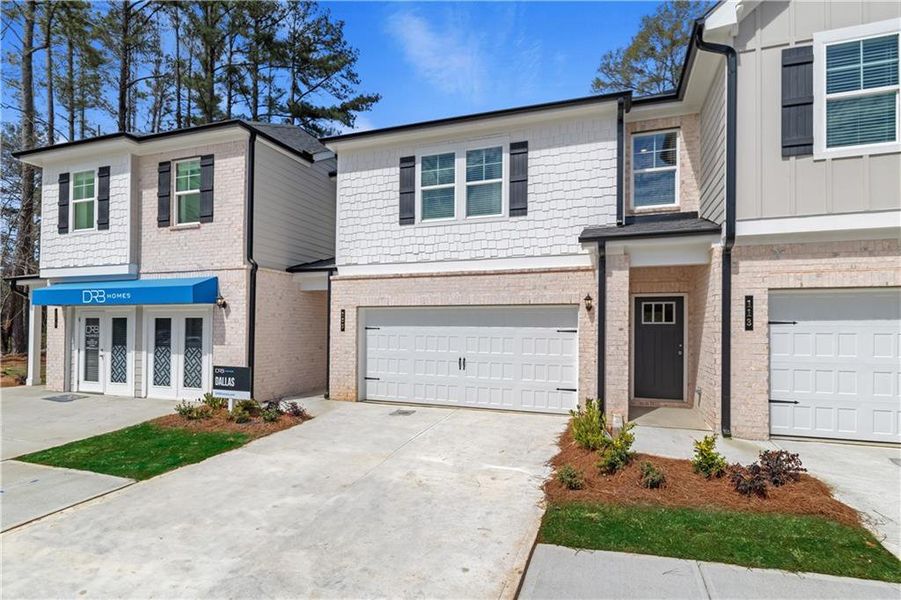 Front exterior of a new home in Diamante, Stockbridge, GA, highlighting curb appeal (Image 22).