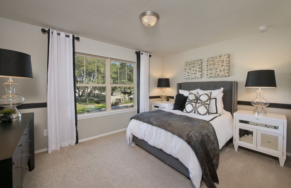 Secondary bedroom with large windows