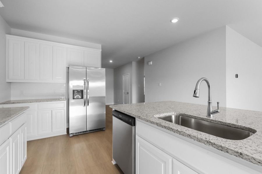 Representative furnished interior of a home built from the Garrison I by Cheldan Homes in Stoneview, Glen Rose (Image 9).