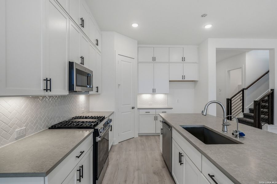 Furnished interior view inside a new home in Prominence, San Antonio (Image 14).