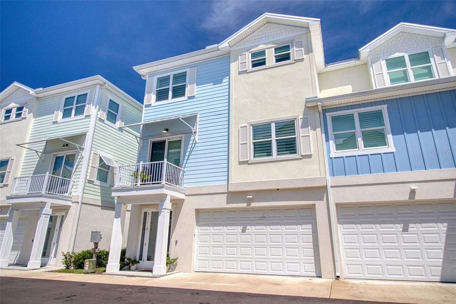Front exterior of a new home in , Dunedin, FL, highlighting curb appeal (Image 2).