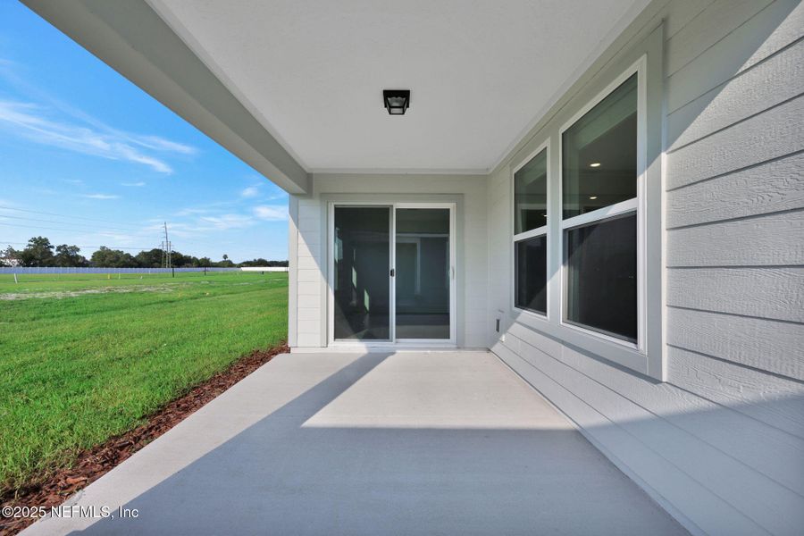 Exterior details and patio area of a home in Wells Landing, Jacksonville (Image 2). Exterior details and patio area of a home in Wells Landing, Jacksonville (Image 2).