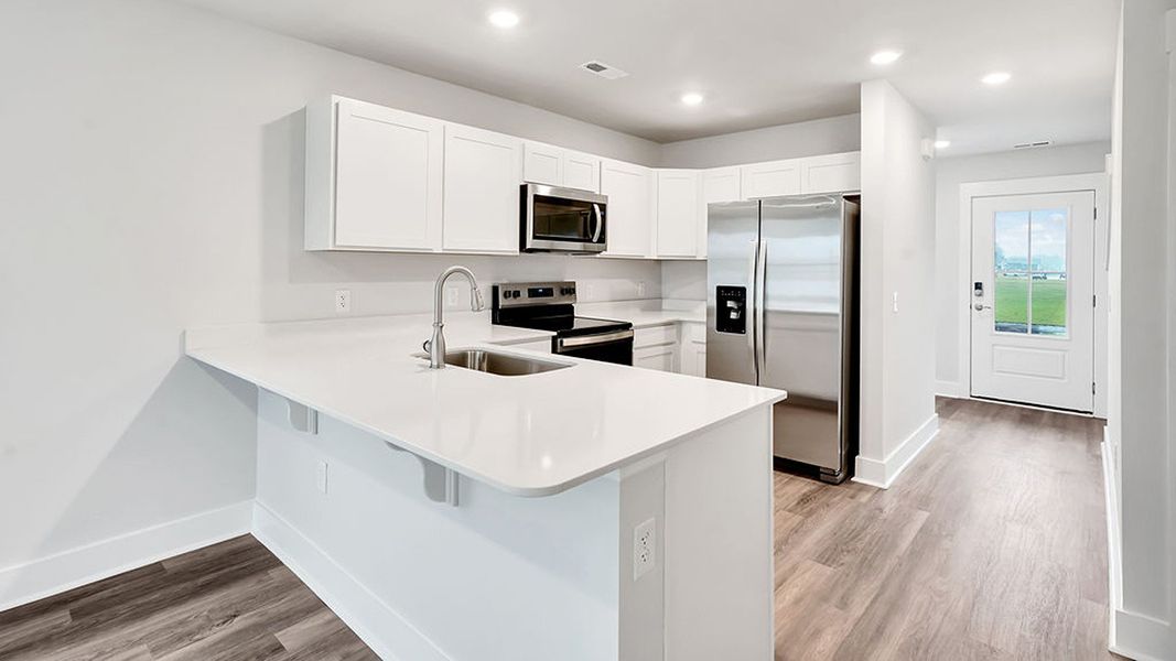 Furnished interior view inside a new home in The Landing at Sidbury Station, Castle Hayne (Image 6).