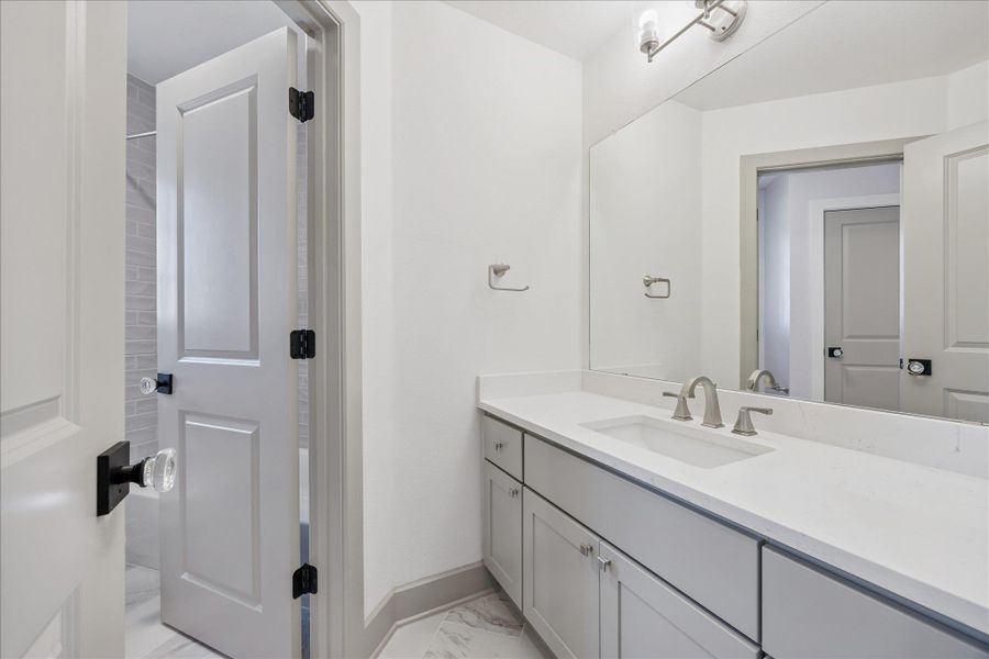 Furnished interior view inside a new home in Sweetwater - 60', Austin (Image 3).