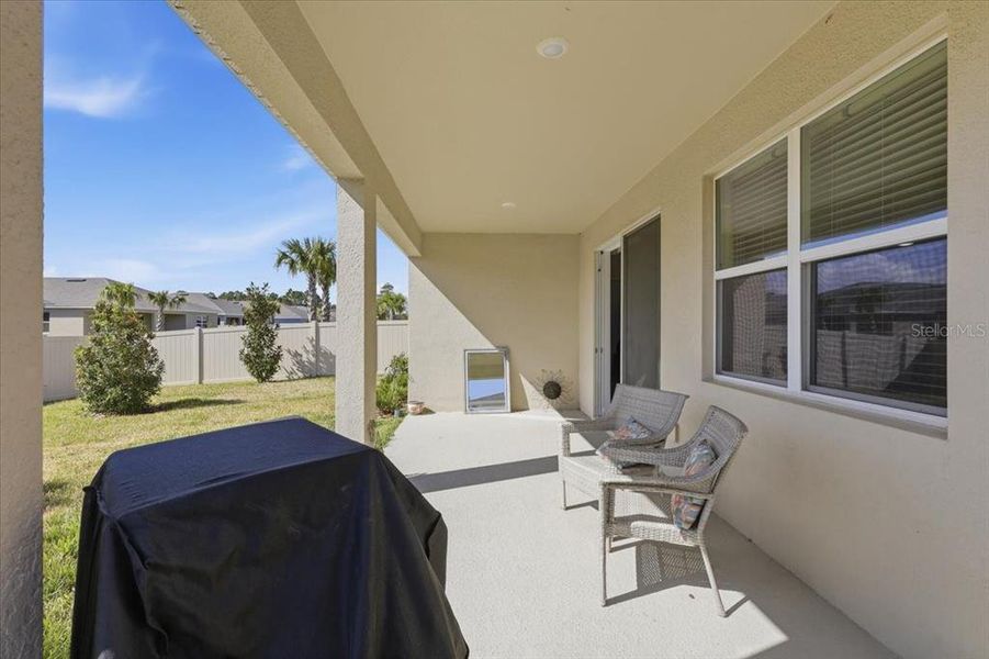Exterior details and patio area of a home in Archers Mill, Ormond Beach (Image 25).