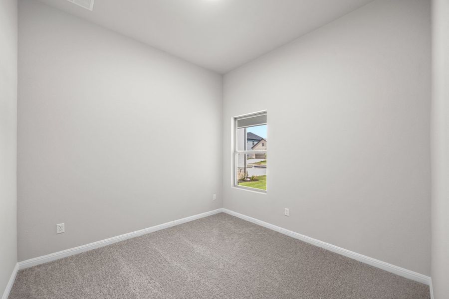 Bedroom in the Spruce home plan by Trophy Signature Homes - REPRESENTATIVE PHOTO Bedroom in the Spruce home plan by Trophy Signature Homes - REPRESENTATIVE PHOTO