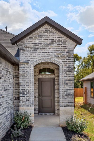 Exterior details and patio area of a home in Trinity Ranch, Elgin (Image 3).