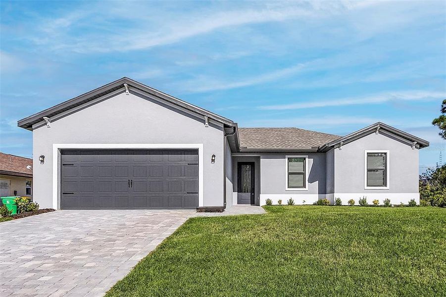 Front exterior of a new home in Lake Gallagher Estates, Dover, FL, highlighting curb appeal (Image 2).
