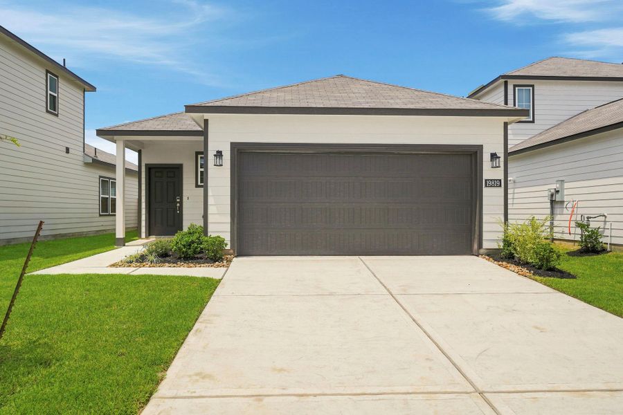 Front exterior of a new home in Northpark South, Porter, TX, highlighting curb appeal (Image 17).