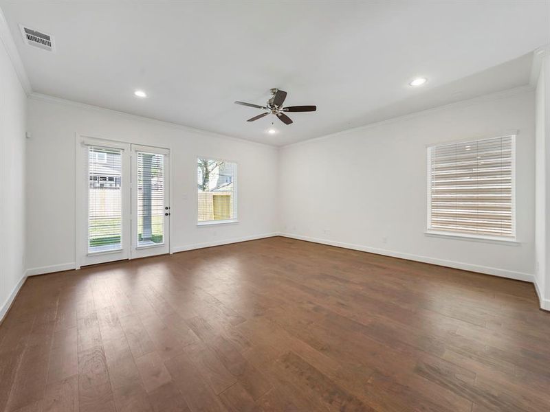 The Living Room has a view of the entire backyard! (Sample photos of a completed Warwick floor plan. The image may feature alternative selections and/or upgrades.)