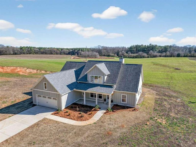 Front exterior of a new home in , Comer, GA, highlighting curb appeal (Image 27).