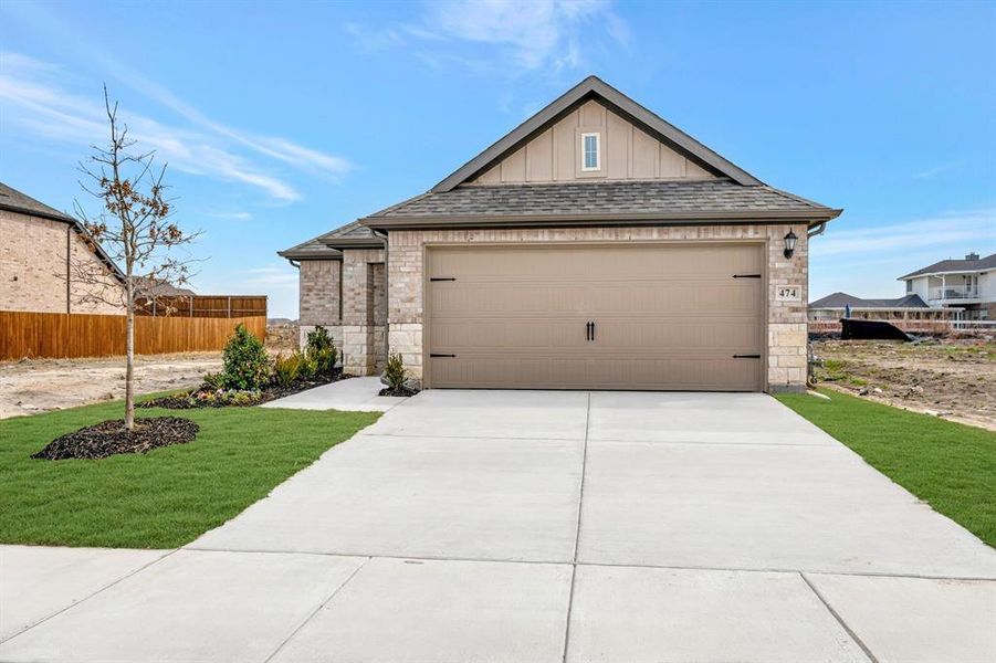 Front exterior of a new home in Elevon, Lavon, TX, highlighting curb appeal (Image 22).