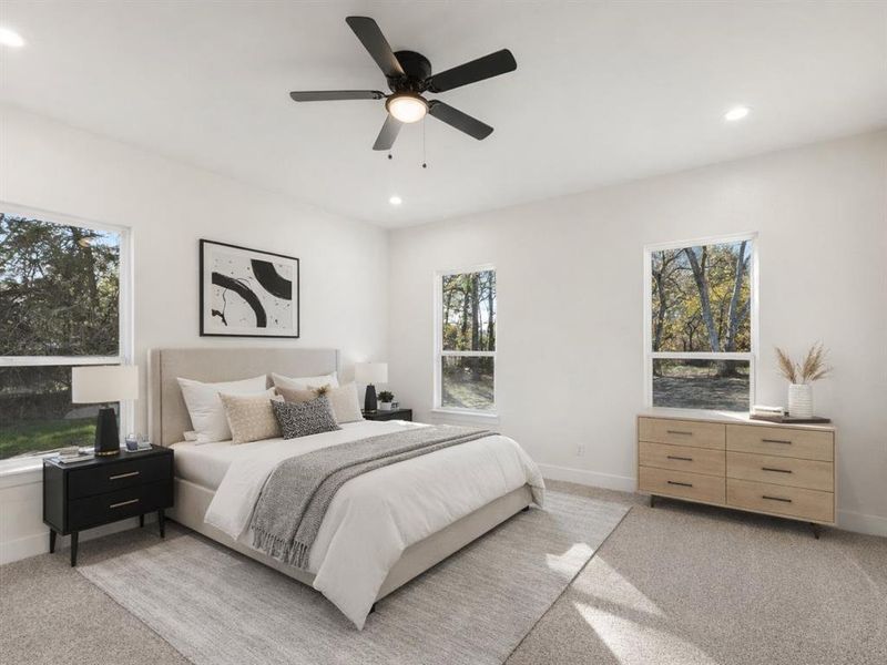Bedroom with ceiling fan, light carpet, and recessed lighting