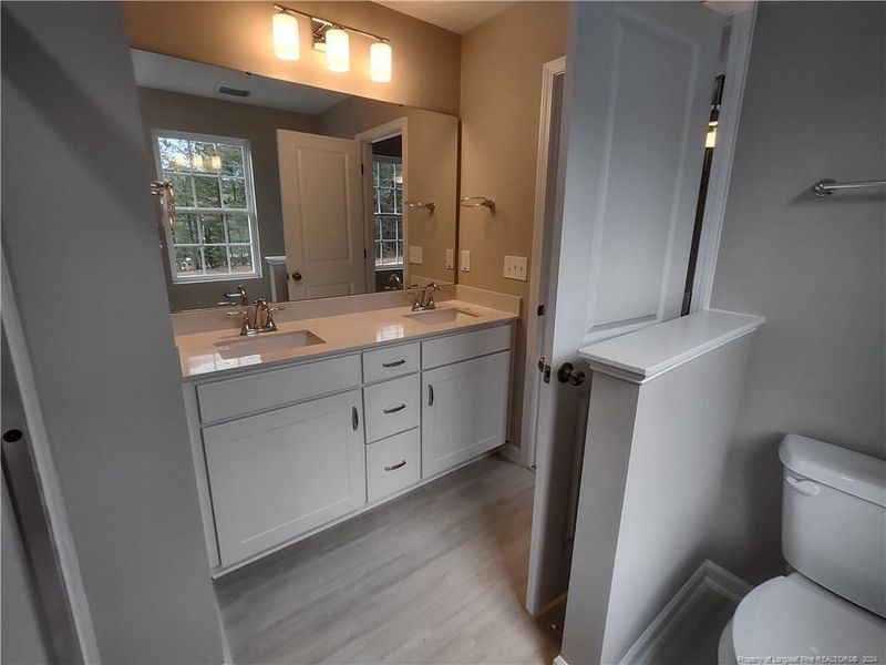 Double vanity with quartz counter tops