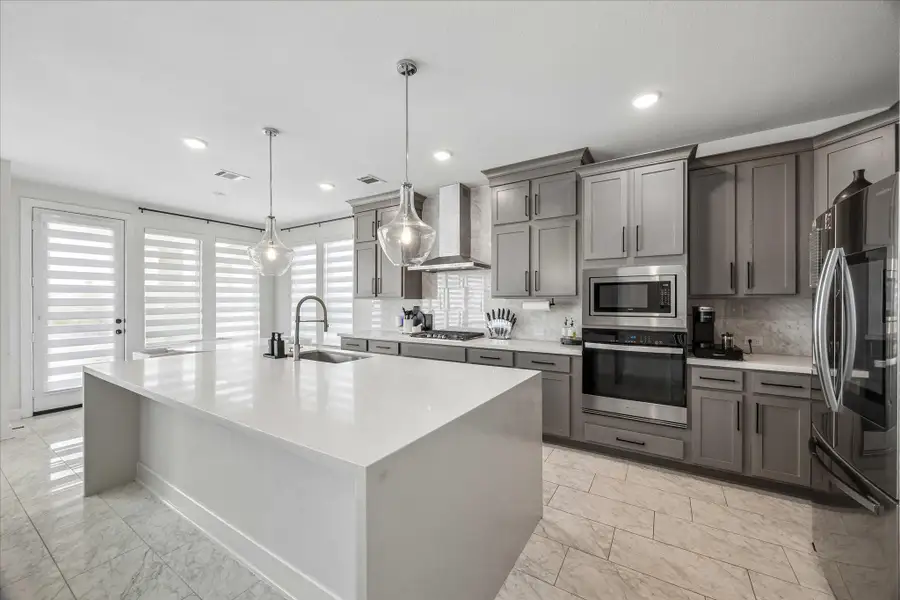 Furnished interior view inside a new home in Del Bello Lakes – 60', Manvel (Image 29).