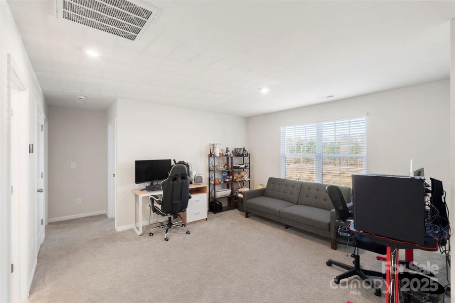 Furnished interior view inside a new home in Waxhaw Landing, Monroe (Image 27).