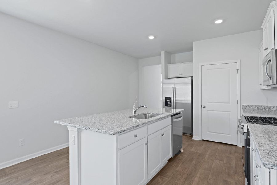 Furnished interior view inside a new home in Pine Hills at Cane Bay, Summerville (Image 5).