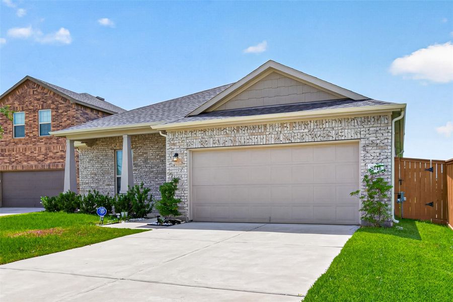 Front exterior of a new home in Marvida, Cypress, TX, highlighting curb appeal (Image 29).