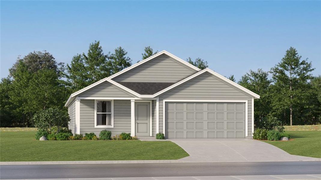 View of front of property featuring a front yard and a garage