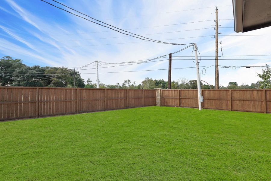 Great corner lot with space to create your own backyard oasis!