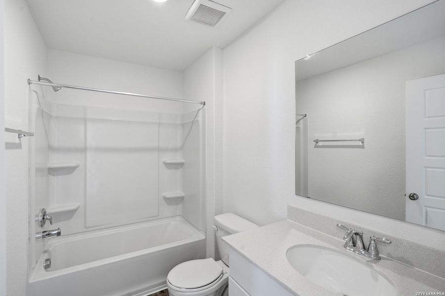 Furnished interior view inside a new home in Vista Real, Converse (Image 14).