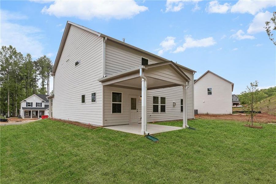 Front exterior of a new home in , Villa Rica, GA, highlighting curb appeal (Image 1).