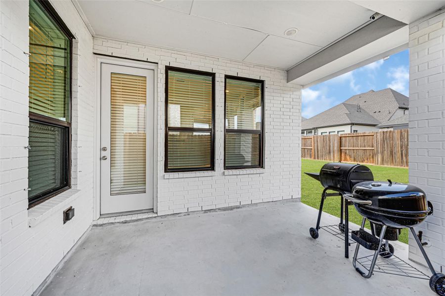 Exterior details and patio area of a home in Riceland, Mont Belvieu (Image 3). Exterior details and patio area of a home in Riceland, Mont Belvieu (Image 3).