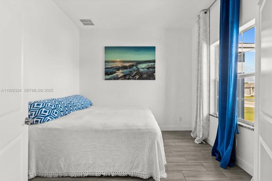 Furnished interior view inside a new home in , Port St. Lucie (Image 19).