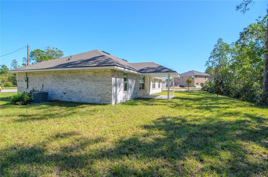 Exterior details and patio area of a home in Palm Coast, Palm Coast (Image 21). Exterior details and patio area of a home in Palm Coast, Palm Coast (Image 21).