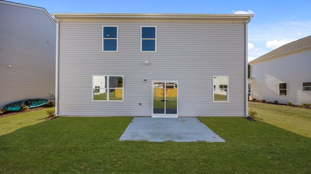 Exterior details and patio area of a home in West New Bern, New Bern (Image 25).