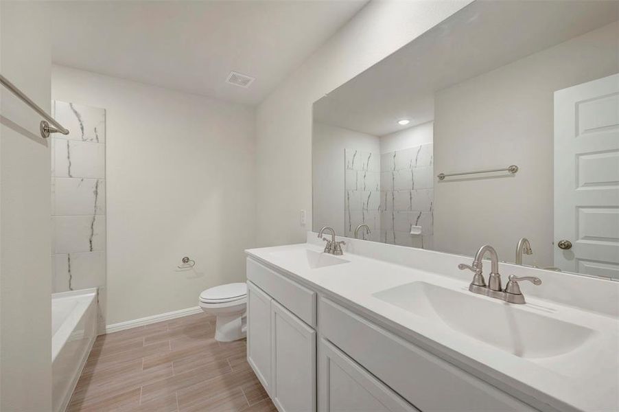 Furnished interior view inside a new home in Verandah, Royse City (Image 9).