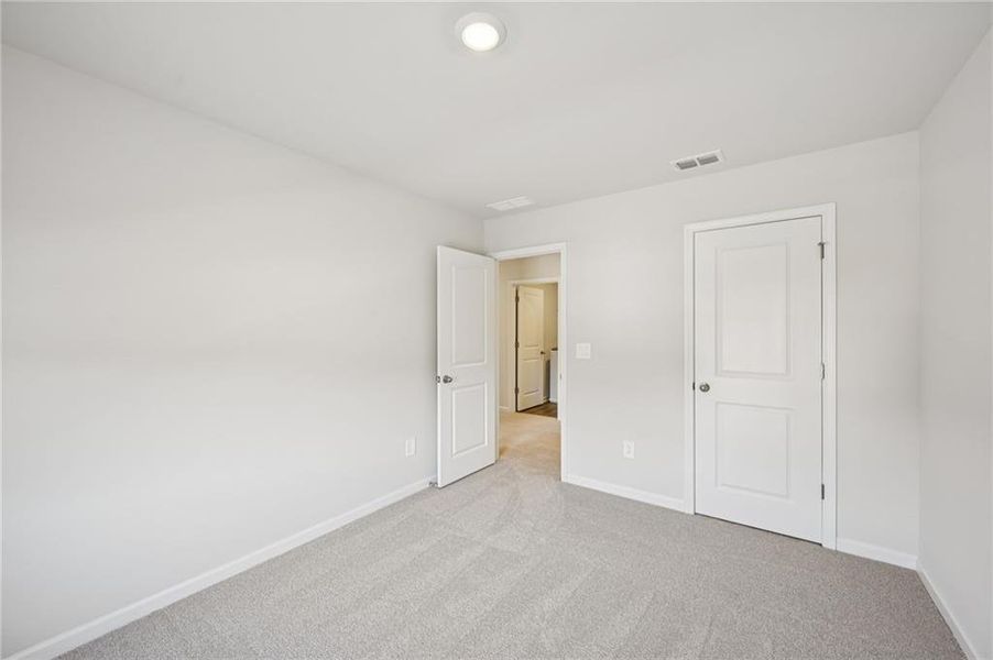 Spacious, unfurnished interior of a new home in Creekside at Oxford Park, Fairburn (Image 31).