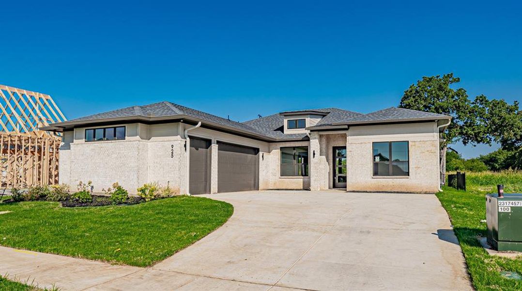 Front exterior of a new home in , Burleson, TX, highlighting curb appeal (Image 22).
