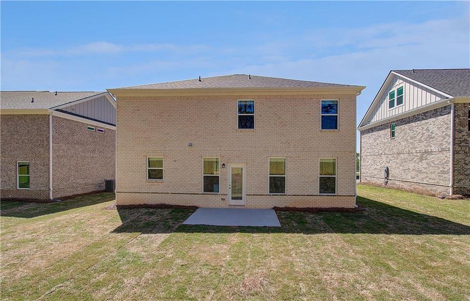 Exterior details and patio area of a home in Bowers Farm, McDonough (Image 16).