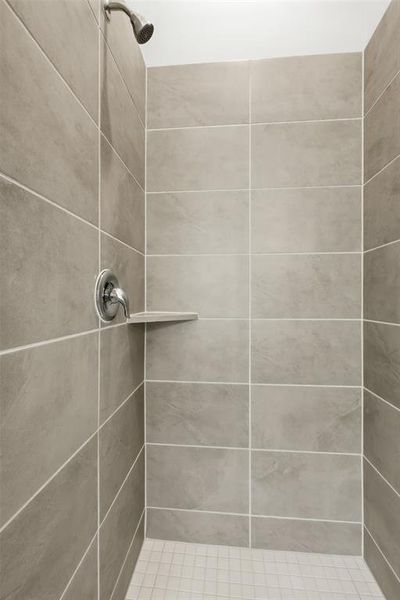 Full bathroom featuring a stall shower