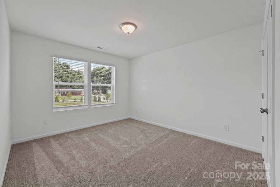 Spacious, unfurnished interior of a new home in Piper Landing, Concord (Image 33).