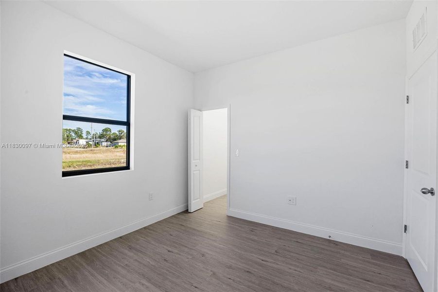 Spacious, unfurnished interior of a new home in , Lehigh Acres (Image 21).