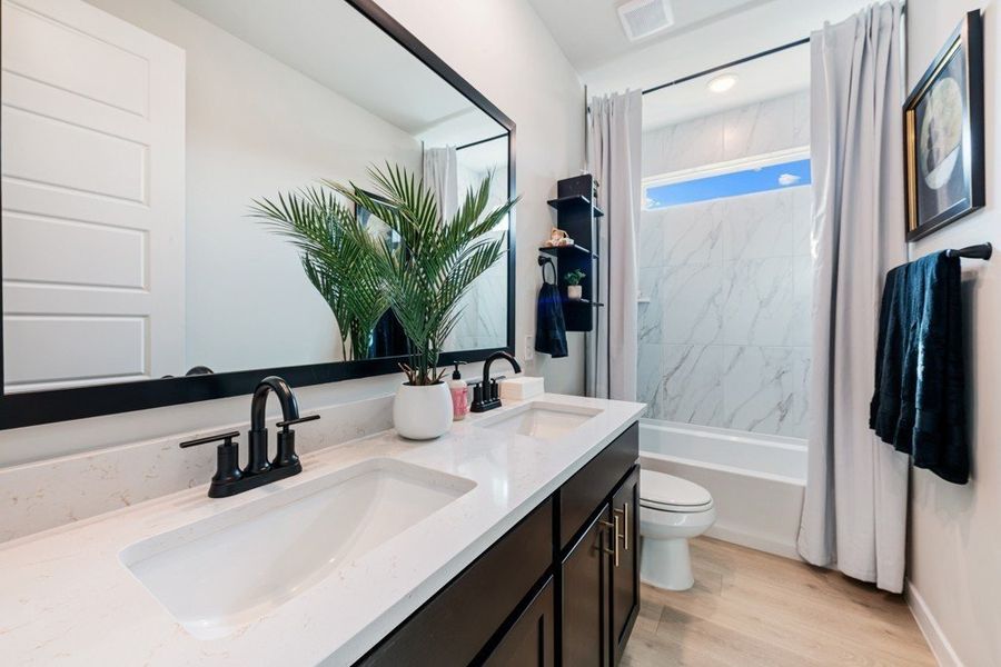 Representative furnished interior of a home built from the Arlington by Hakes Brothers in Hickory Ridge Estates, Elmendorf (Image 7).