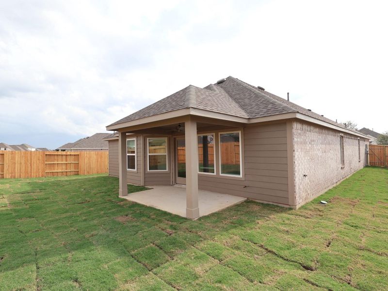 Front exterior of a new home in Sorella, Tomball, TX, highlighting curb appeal (Image 12).