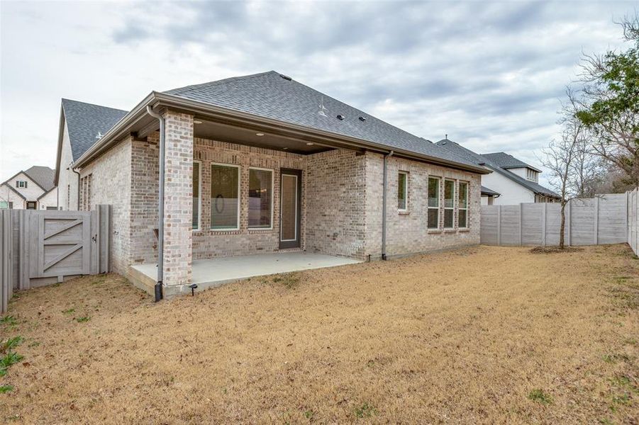Exterior details and patio area of a home in Painted Tree - South, McKinney (Image 22).