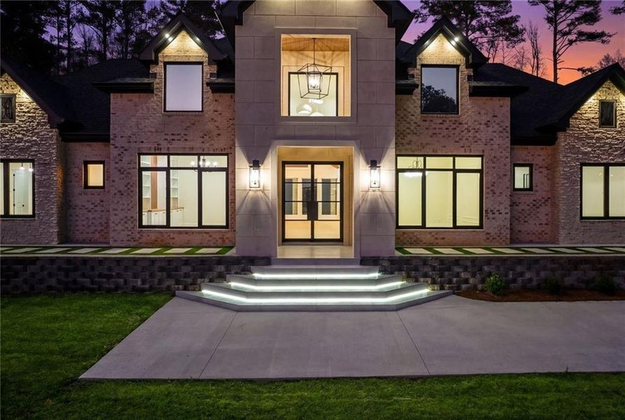 Front exterior of a new home in , Dacula, GA, highlighting curb appeal (Image 27).