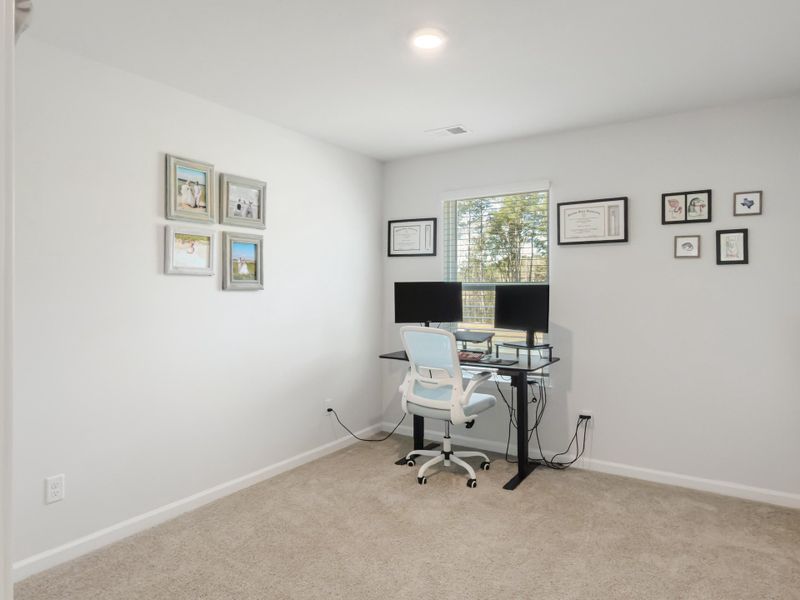 Furnished interior view inside a new home in Pine Hills at Cane Bay, Summerville (Image 17). Furnished interior view inside a new home in Pine Hills at Cane Bay, Summerville (Image 17).