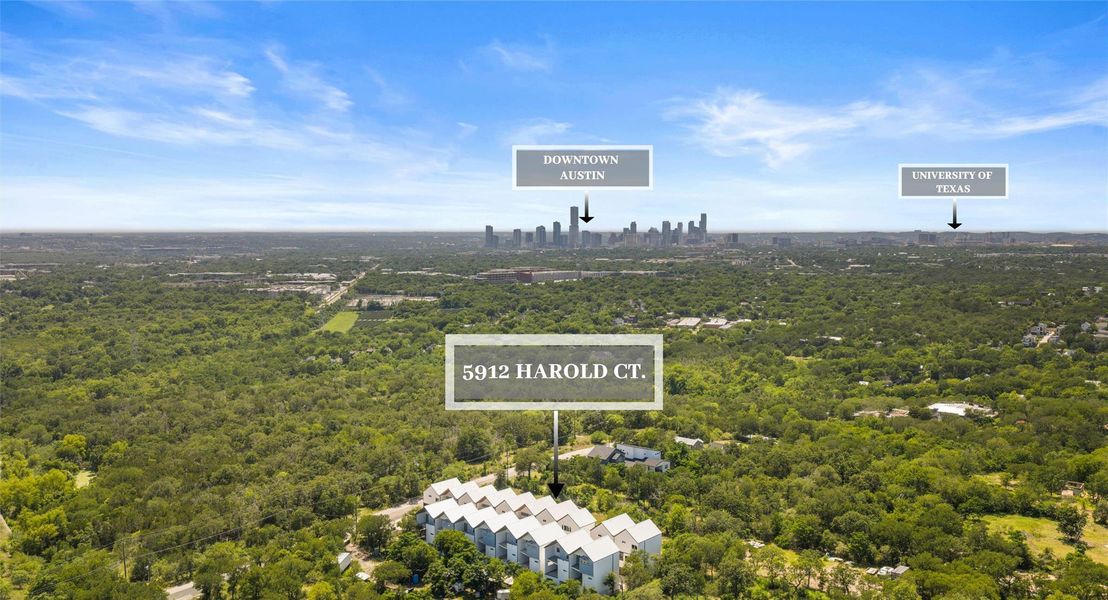 An aerial look at the community's green East Austin setting — mature tree cover and quiet surroundings, with the energy of the city only minutes away. Model No. 104 Shown.