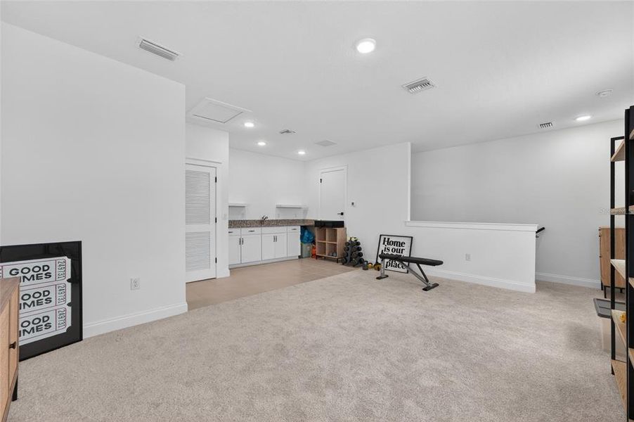 Furnished interior view inside a new home in , Winter Garden (Image 9).