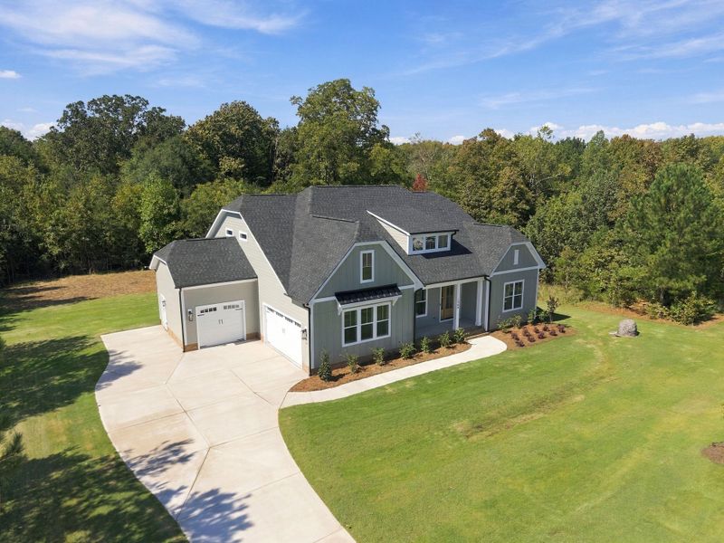 Front exterior of a new home in Shepherds Trace, Clover, SC, highlighting curb appeal (Image 30). Front exterior of a new home in Shepherds Trace, Clover, SC, highlighting curb appeal (Image 30).